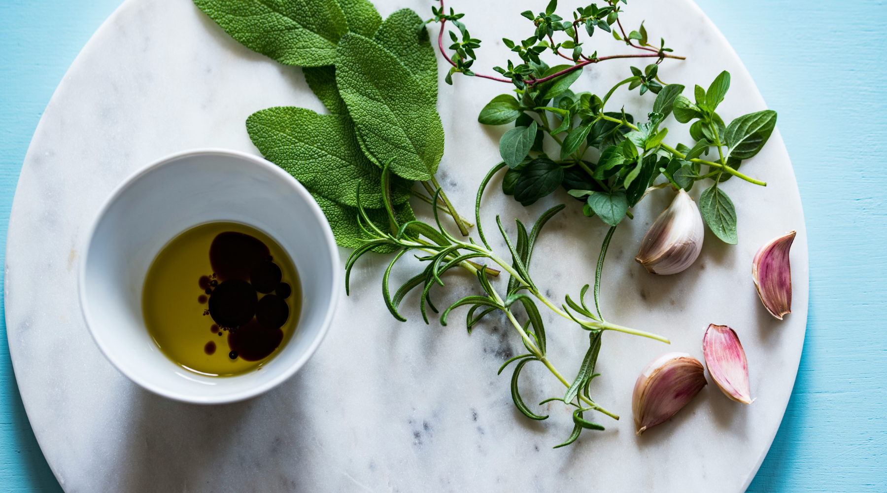 Fresh herbs and olive oil and garlic